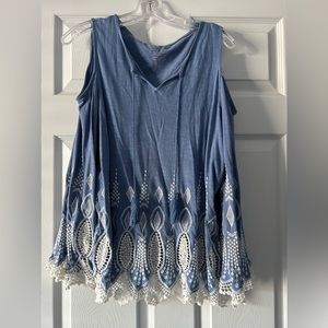 Chico’s blue and white cold shoulder shirt. Size 2